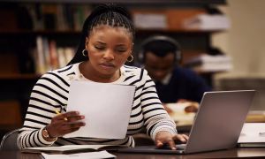 Animal science researcher preparing a livestock research manuscript for academic publication